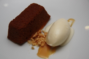 Spiced carrot cake with cream cheese ice cream and salted peanuts